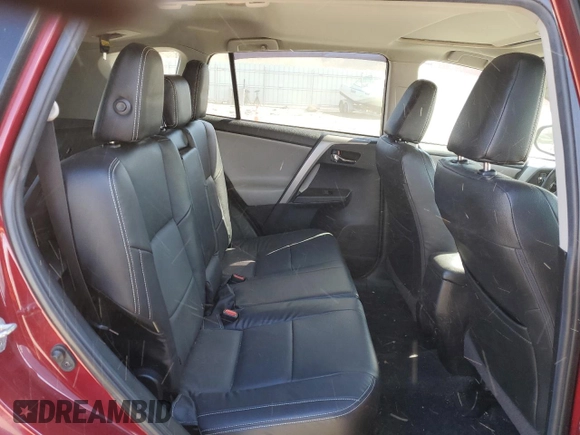 2018 Toyota RAV4 XLE with VIN 2T3RFREVXJW715931, listed as a Copart auction lot 48130715 with 106,324 mi miles and Salvage Title. Bid and sale history available at DreamBid. Image 11.