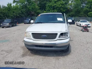 2000 Ford F-150 XL with VIN 1FTZF1720YNB37392, listed as a IAAI auction lot 42460974 with Not provided miles and . Bid and sale history available at DreamBid. Image 12.