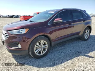 2019 Ford Edge SEL z VIN 2FMPK4J93KBB67592, wystawiony jako Copart lot #52222225 z przebiegiem 62 031 mil mil oraz Szkoda całkowita • Salvage title. Historia ofert i sprzedaży dostępna na DreamBid. Obrazek 1.
