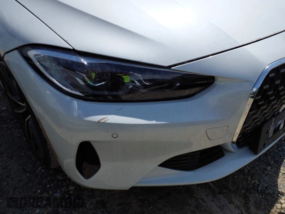 2022 BMW 4 Series 430i xDrive with VIN WBA73AP09NCJ28175, listed as a IAAI auction lot 41486064 with 27,312 mi miles and . Bid and sale history available at DreamBid. Image 21.