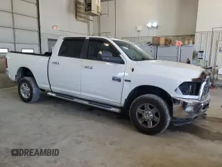 2012 Ram 2500 SLT with VIN 3C6TD5DT5CG112948, listed as a Copart auction lot 68581694 with 207,960 mi miles and Salvage title. Bid and sale history available at DreamBid. Image 4.