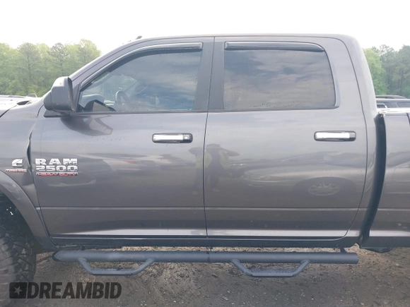 2017 Ram 2500 SLT with VIN 3C6UR5DL9HG561899, listed as a IAAI auction lot 42071797 with 134,808 mi miles and . Bid and sale history available at DreamBid. Image 14.