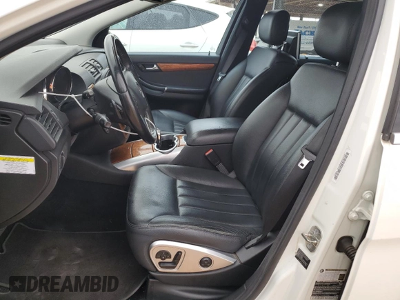 2009 Mercedes-Benz R 3.5L with VIN 4JGCB65E79A092256, listed as a Copart auction lot 79329064 with 243,943 mi miles and Salvage Title. Bid and sale history available at DreamBid. Image 7.