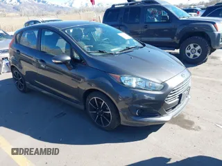 2015 Ford Fiesta SE with VIN 3FADP4EJ9FM115097, listed as a IAAI auction lot 41883374 with 88,475 mi miles. Bid and sale history available at carsss.com. Image 1.