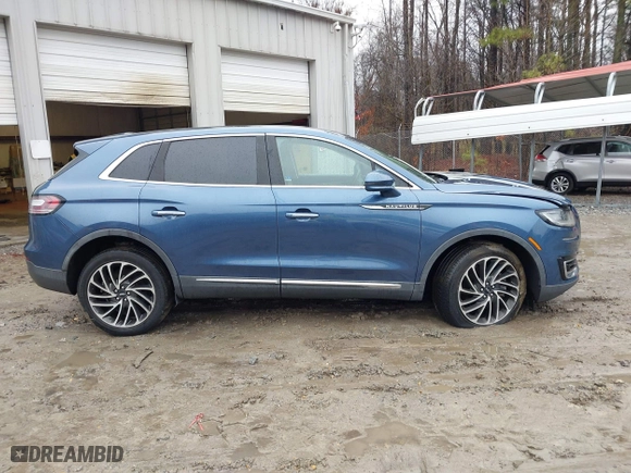 2019 Lincoln Nautilus Reserve with VIN 2LMPJ8LP9KBL14914, listed as a IAAI auction lot 41561348 with 8,887 mi miles. Bid and sale history available at carsss.com. Image 13.