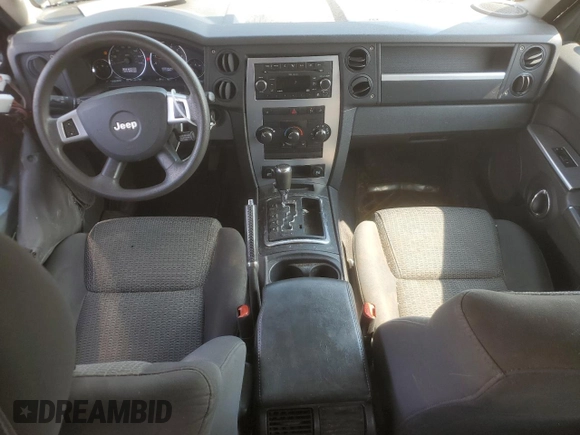 2009 Jeep Commander Sport z VIN 1J8HG48K39C501268, wystawiony jako Copart lot #64312325 z przebiegiem 184 794 mil mil oraz Szkoda całkowita • Salvage title. Historia ofert i sprzedaży dostępna na DreamBid. Obrazek 8.