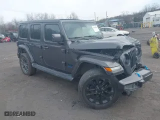 2021 Jeep Wrangler 4xe Unlimited Sahara with VIN 1C4JJXP65MW676726, listed as a IAAI auction lot 41795701 with 38,480 mi miles. Bid and sale history available at carsss.com. Image 1.
