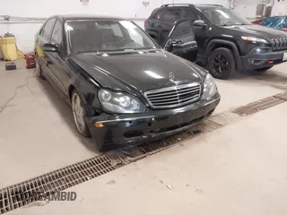 2002 Mercedes-Benz S-Class 6.0L with VIN WDBNG78J42A252823, listed as a IAAI auction lot 42051191 with 133,123 mi miles. Bid and sale history available at carsss.com. Image 13.