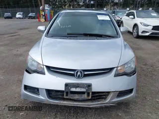 2007 Acura CSX Premium z VIN 2HHFD56777H202417, wystawiony jako IAAI lot #41938383 z przebiegiem 141 652 mil mil oraz . Historia ofert i sprzedaży dostępna na DreamBid. Obrazek 12.
