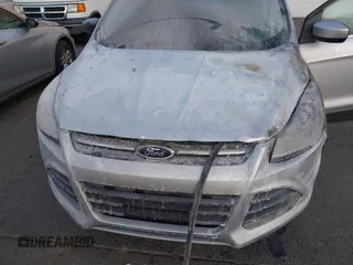 2014 Ford Escape SE с VIN 1FMCU0GX4EUA64221, выставлен на аукционе IAAI как лот 41425001 с пробегом Не указан миль и . История ставок и продаж доступна на DreamBid. Изображение 13.