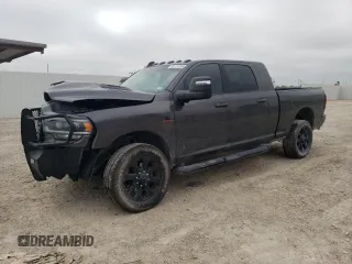 2024 Ram 2500 Laramie with VIN 3C6UR5NL7RG277672, listed as a Copart auction lot 69711264 with 14,818 mi miles and Salvage title. Bid and sale history available at DreamBid. Image 1.