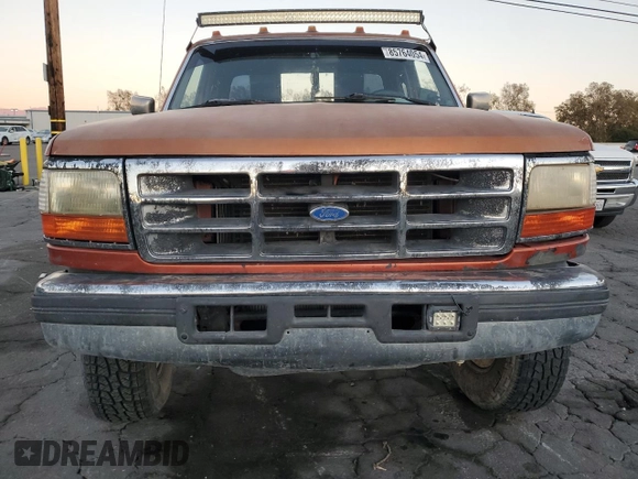 1994 Ford F-250 with VIN 1FTHX25F2RKB78761, listed as a Copart auction lot 85764054 with 223,641 mi miles and Salvage Title. Bid and sale history available at carsss.com. Image 5.