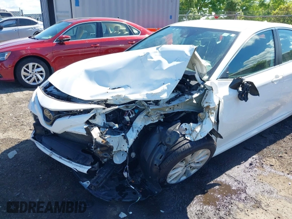 2019 Toyota Camry LE with VIN 4T1B11HK2KU187475, listed as a IAAI auction lot 42192293 with 44,413 mi miles and . Bid and sale history available at DreamBid. Image 6.