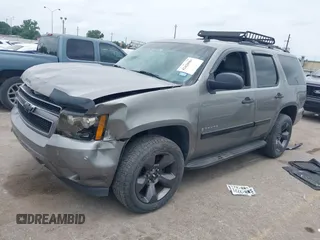 2007 Chevrolet Tahoe LS with VIN 1GNFC13C57R279441, listed as a IAAI auction lot 42428981 with 229,827 mi miles and . Bid and sale history available at DreamBid. Image 18.