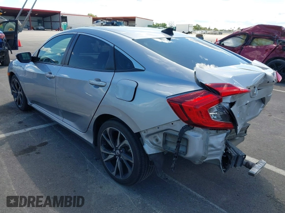 2019 Honda Civic Sedan Sport with VIN 2HGFC2F82KH519464, listed as a IAAI auction lot 41940030 with 59,718 mi miles. Bid and sale history available at carsss.com. Image 3.