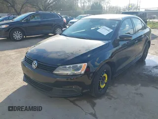 2014 Volkswagen Jetta Sedan SE w/Connectivity with VIN 3VWD07AJ5EM238638, listed as a IAAI auction lot 41518500 with 211,243 mi miles. Bid and sale history available at carsss.com. Image 6.
