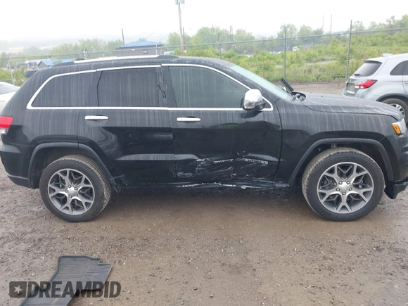 2019 Jeep Grand Cherokee Limited z VIN 1C4RJFBG7KC609265, wystawiony jako IAAI lot #42354587 z przebiegiem 105 986 mil mil oraz . Historia ofert i sprzedaży dostępna na DreamBid. Obrazek 13.