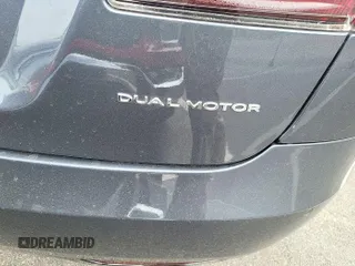 2020 Tesla Model S Long Range with VIN 5YJSA1E24LF355944, listed as a IAAI auction lot 42246664 with 21,688 mi miles and . Bid and sale history available at DreamBid. Image 1.