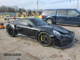 2018 Porsche 911 GT2 RS with VIN WP0AE2A96JS185773, listed as a Copart auction lot 85674904 with 5,843 mi miles and Salvage Title. Bid and sale history available at carsss.com. Image 4.