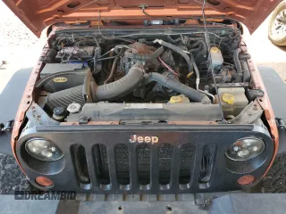 2011 Jeep Wrangler Unlimited Rubicon with VIN 1J4BA6H13BL538385, listed as a Copart auction lot 64080075 with 90,459 mi miles and Salvage title. Bid and sale history available at DreamBid. Image 12.