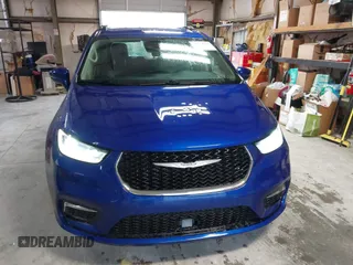 2021 Chrysler Pacifica Touring L z VIN 2C4RC1BGXMR503108, wystawiony jako IAAI lot #41914136 z przebiegiem 98 685 mil mil oraz . Historia ofert i sprzedaży dostępna na DreamBid. Obrazek 6.