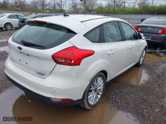 2015 Ford Focus Titanium with VIN 1FADP3N23FL293432, listed as a IAAI auction lot 41929774 with 100,865 mi miles. Bid and sale history available at carsss.com. Image 4.
