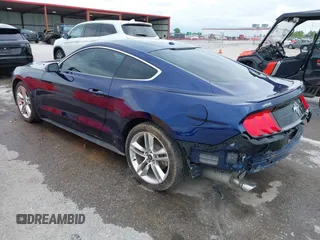 2020 Ford Mustang EcoBoost with VIN 1FA6P8TH2L5108722, listed as a IAAI auction lot 42182257 with 65,651 mi miles and . Bid and sale history available at DreamBid. Image 3.