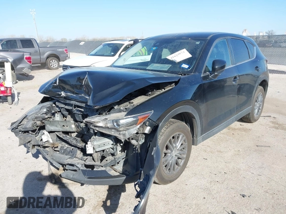 2020 Mazda CX-5 Touring with VIN JM3KFACM0L0780265, listed as a IAAI auction lot 41825873 with 151,888 mi miles. Bid and sale history available at carsss.com. Image 17.