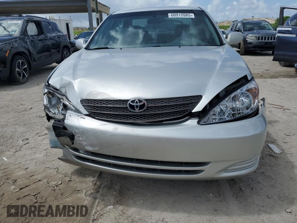 2004 Toyota Camry LE z VIN 4T1BE32K34U305013, wystawiony jako Copart lot #60912085 z przebiegiem 127 247 mil mil oraz Szkoda całkowita • Salvage title. Historia ofert i sprzedaży dostępna na DreamBid. Obrazek 5.