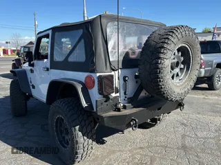 2012 Jeep Wrangler Sport with VIN 1C4GJWAG5CL201499, listed as a Copart auction lot 55247615 with 116,414 mi miles and Clean Title. Bid and sale history available at carsss.com. Image 3.