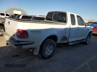 1999 Ford F-150 XL с VIN 1FTRX08L3XKB18916, выставлен на аукционе Copart как лот 81892064 с пробегом 175 280 миль миль и Списание • Salvage title. История ставок и продаж доступна на DreamBid. Изображение 3.