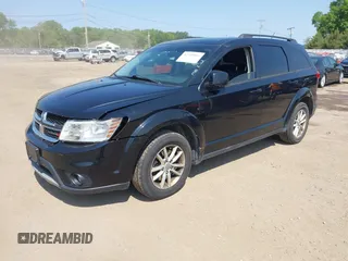 2015 Dodge Journey SXT with VIN 3C4PDCBG5FT668662, listed as a IAAI auction lot 42358666 with 176,278 mi miles and . Bid and sale history available at DreamBid. Image 2.