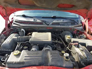 2001 Dodge Dakota Sport with VIN 1B7GG2AN51S148828, listed as a IAAI auction lot 42095653 with 232,995 mi miles and . Bid and sale history available at carsss.com. Image 10.