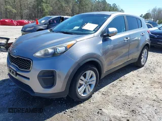 2017 Kia Sportage LX with VIN KNDPM3AC4H7156977, listed as a IAAI auction lot 41851476 with 101,778 mi miles. Bid and sale history available at carsss.com. Image 2.