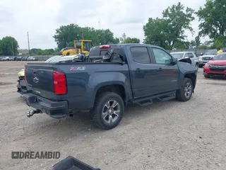 2019 Chevrolet Colorado 4WD Z71 with VIN 1GCGTDEN5K1328061, listed as a IAAI auction lot 42505934 with 76,520 mi miles and . Bid and sale history available at DreamBid. Image 4.