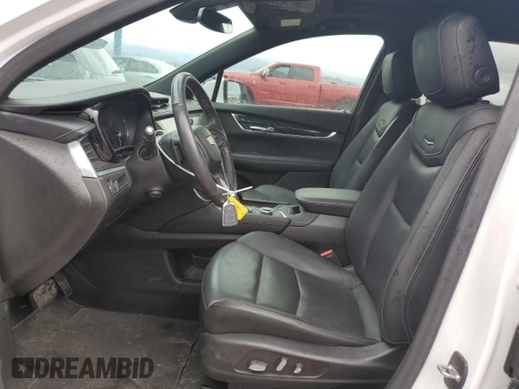 2022 Cadillac XT6 Premium Luxury with VIN 1GYKPCRS6NZ127584, listed as a Copart auction lot 48429085 with 24,994 mi miles and Salvage Title. Bid and sale history available at carsss.com. Image 7.