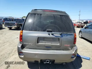 2006 GMC Envoy XL Denali with VIN 1GKET66M566114516, listed as a Copart auction lot 68332374 with 186,959 mi miles and Salvage Title. Bid and sale history available at carsss.com. Image 6.