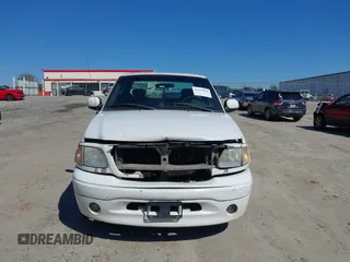 2003 Ford F-150 XL with VIN 2FTRX17273CA82712, listed as a IAAI auction lot 41649838 with 1 mi miles. Bid and sale history available at carsss.com. Image 6.