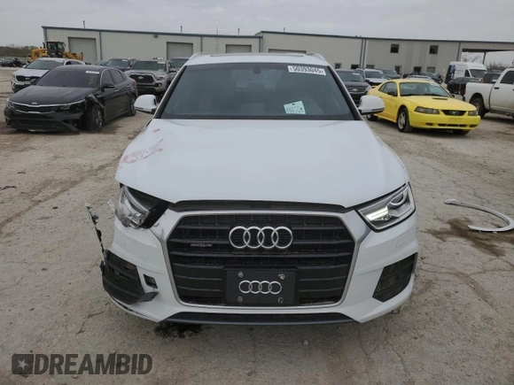 2017 Audi Q3 Premium Plus with VIN WA1JCCFSXHR008243, listed as a Copart auction lot 50393045 with 52,406 mi miles and Salvage title. Bid and sale history available at DreamBid. Image 5.