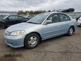 2004 Honda Civic Hybrid with VIN JHMES95634S011665, listed as a Copart auction lot 53797345 with 228,547 mi miles and Salvage Title. Bid and sale history available at carsss.com. Image 1.
