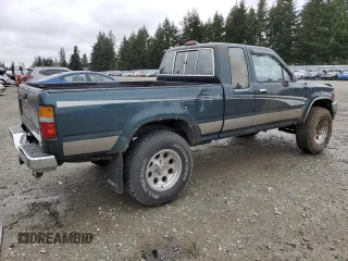 1994 Toyota Pickup SR5 z VIN JT4VN13G1R5144243, wystawiony jako Copart lot #50839095 z przebiegiem 222 885 mil mil oraz Szkoda całkowita • Salvage title. Historia ofert i sprzedaży dostępna na DreamBid. Obrazek 3.