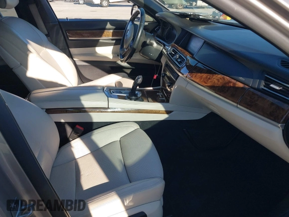 2015 BMW 7 Series 750Li with VIN WBAYE8C55FD782384, listed as a IAAI auction lot 41319363 with 75,784 mi miles. Bid and sale history available at carsss.com. Image 5.