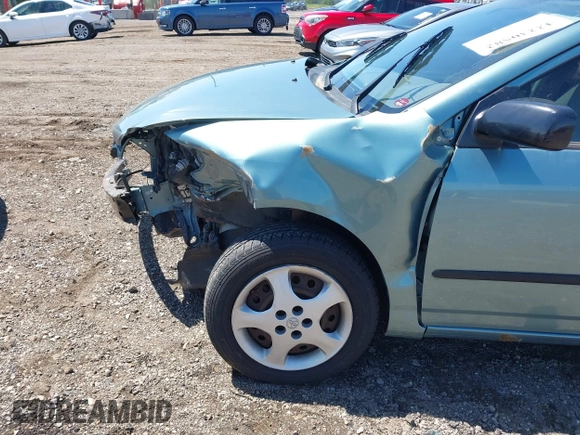 2005 Toyota Corolla CE with VIN 1NXBR32EX5Z373910, listed as a IAAI auction lot 42230582 with 64,004 mi miles and . Bid and sale history available at DreamBid. Image 14.
