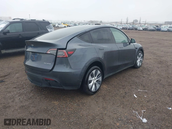 2023 Tesla Model Y Long Range with VIN 7SAYGDEE7PF894362, listed as a IAAI auction lot 41512492 with 27,513 mi miles. Bid and sale history available at carsss.com. Image 4.