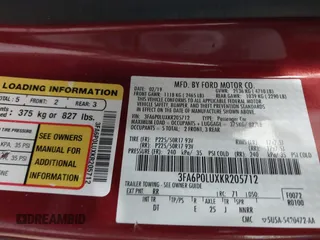 2019 Ford Fusion Hybrid SE with VIN 3FA6P0LUXKR205712, listed as a IAAI auction lot 41267049 with 124,687 mi miles. Bid and sale history available at carsss.com. Image 9.