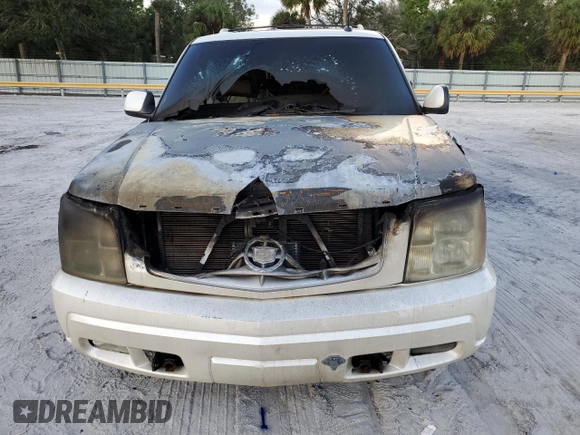 2003 Cadillac Escalade z VIN 1GYEC63T83R133508, wystawiony jako Copart lot #80091524 z przebiegiem Nie podano mil oraz Szkoda całkowita • Salvage title. Historia ofert i sprzedaży dostępna na DreamBid. Obrazek 5.