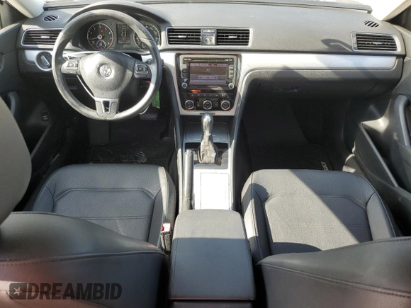 2012 Volkswagen Passat SE with VIN 1VWBH7A30CC045734, listed as a Copart auction lot 61510605 with 130,035 mi miles and Salvage title. Bid and sale history available at DreamBid. Image 8.