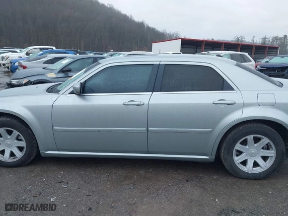 2005 Chrysler 300 with VIN 2C3AA53G65H663507, listed as a IAAI auction lot 41087795 with NaN miles. Bid and sale history available at carsss.com. Image 14.