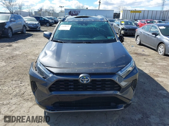 2024 Toyota RAV4 Hybrid SE with VIN 2T3T6RFV0RW051283, listed as a IAAI auction lot 41698931 with 6,465 mi miles and . Bid and sale history available at DreamBid. Image 13.