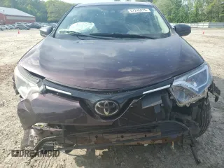2018 Toyota RAV4 LE with VIN 2T3BFREV4JW825326, listed as a Copart auction lot 57245275 with 137,441 mi miles and Salvage title. Bid and sale history available at DreamBid. Image 5.
